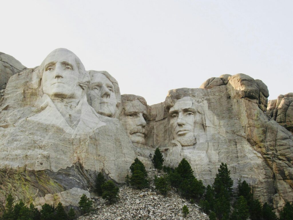 Statues representing former presidents of the United States, symbolizing American political leadership